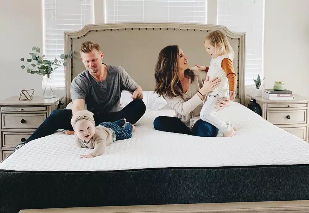Rebellion Worthy Retail Mattresses (with Zippered Covers) 15 Family playing on a bed together