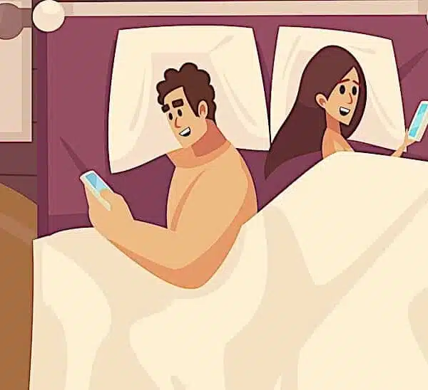 cartoon of a woman and a man in bed reading about DIY mattress resources online