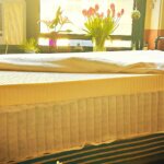 a DIY hybrid mattress with the cover unzipped
