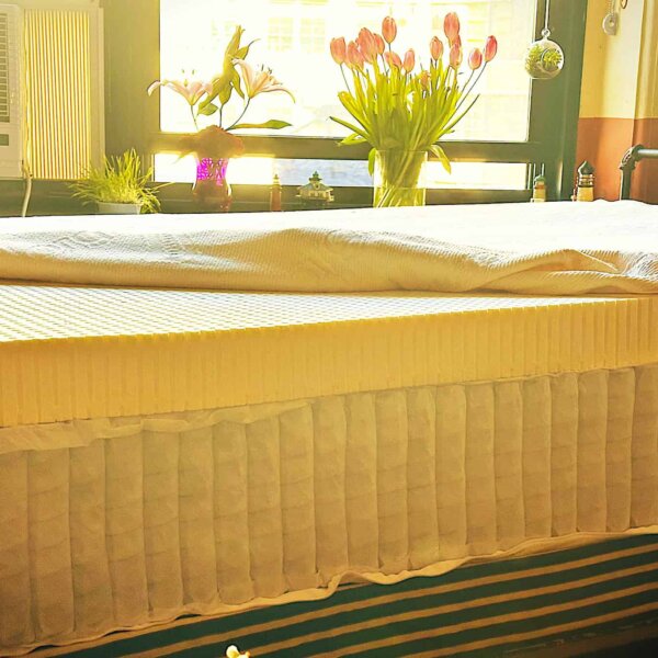 a DIY hybrid mattress with the cover unzipped
