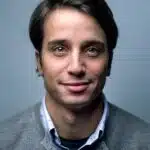 a man smiling for a picture