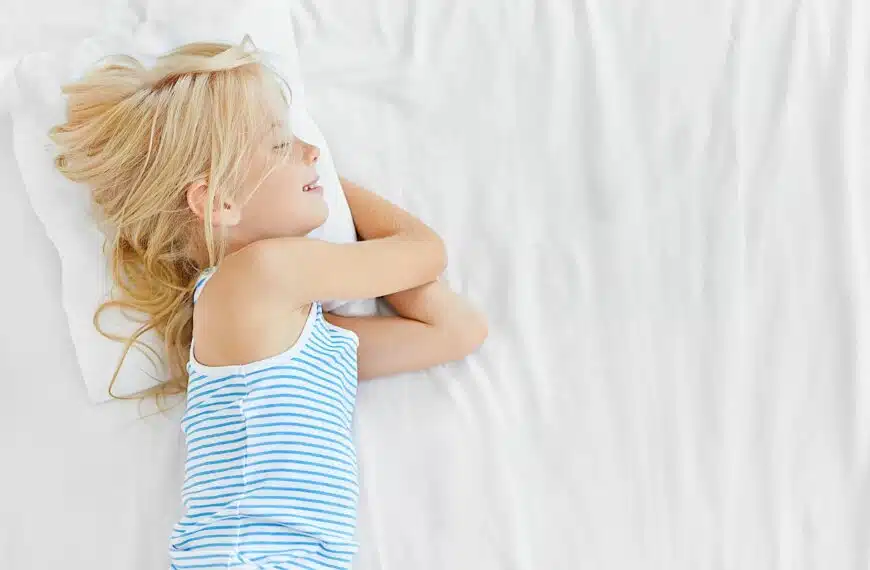 young girl sleeping on her organic diy child's mattress